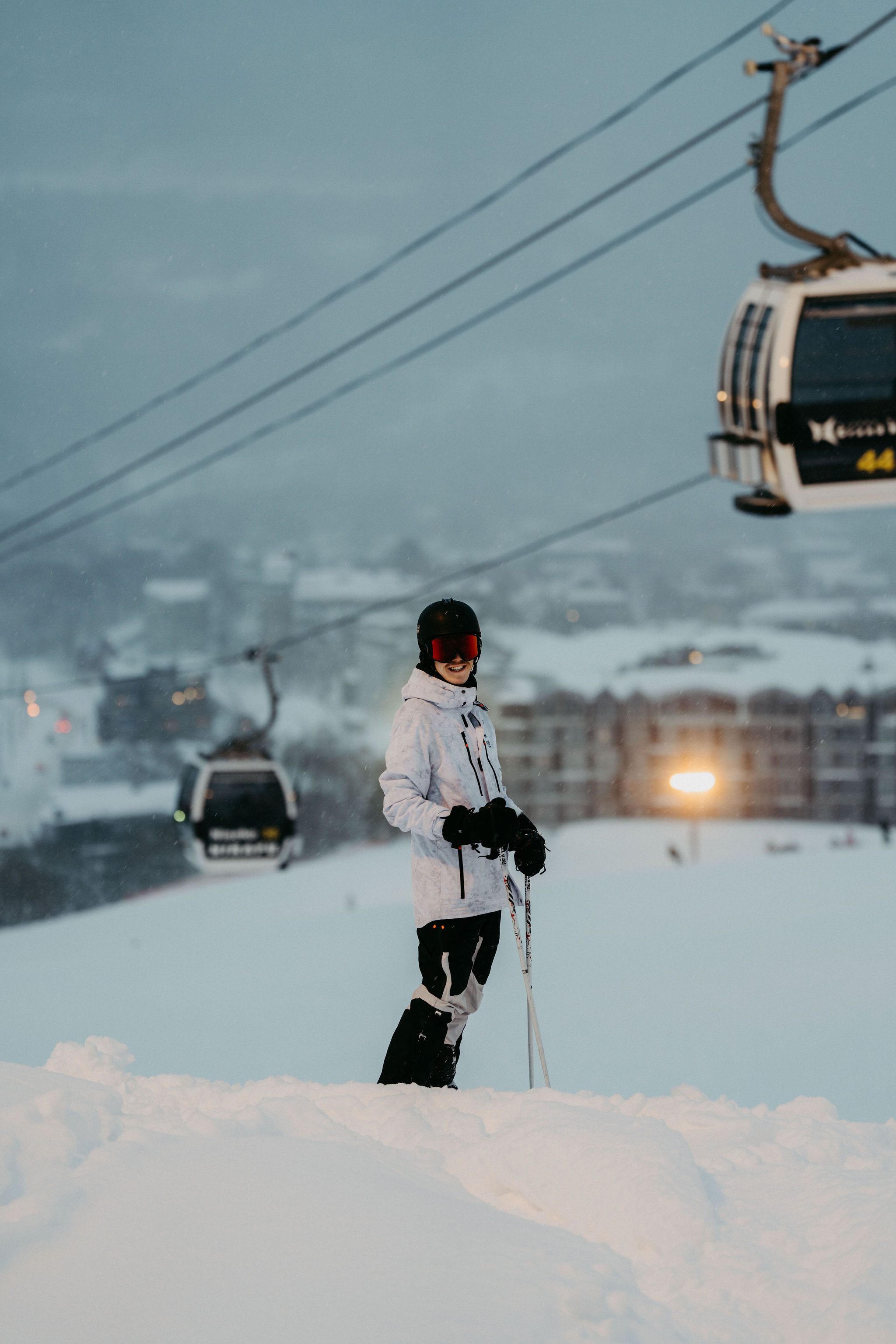 Steaming outdoor onsen surrounded by Japanese winter snow
