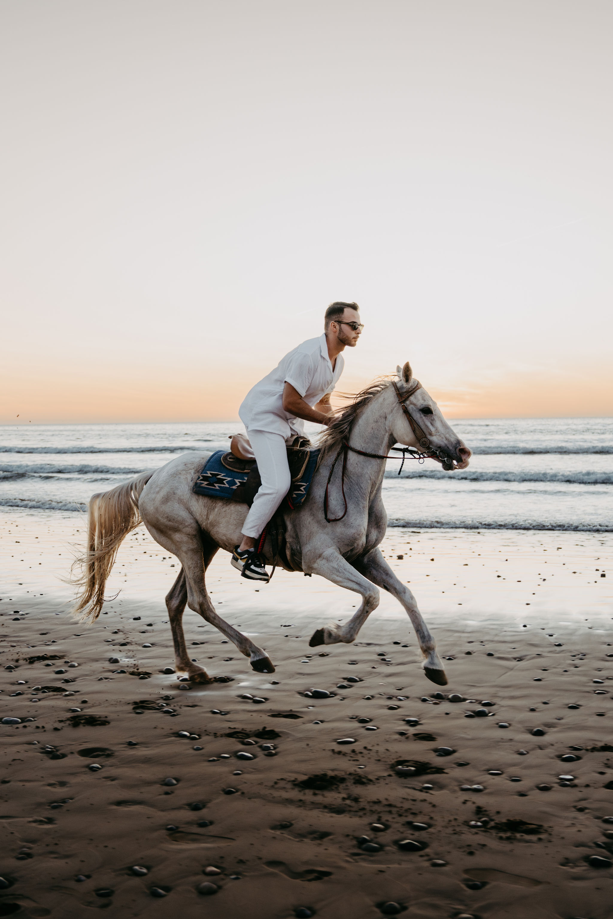 A rider galloping along the Moroccan Atlantic coast