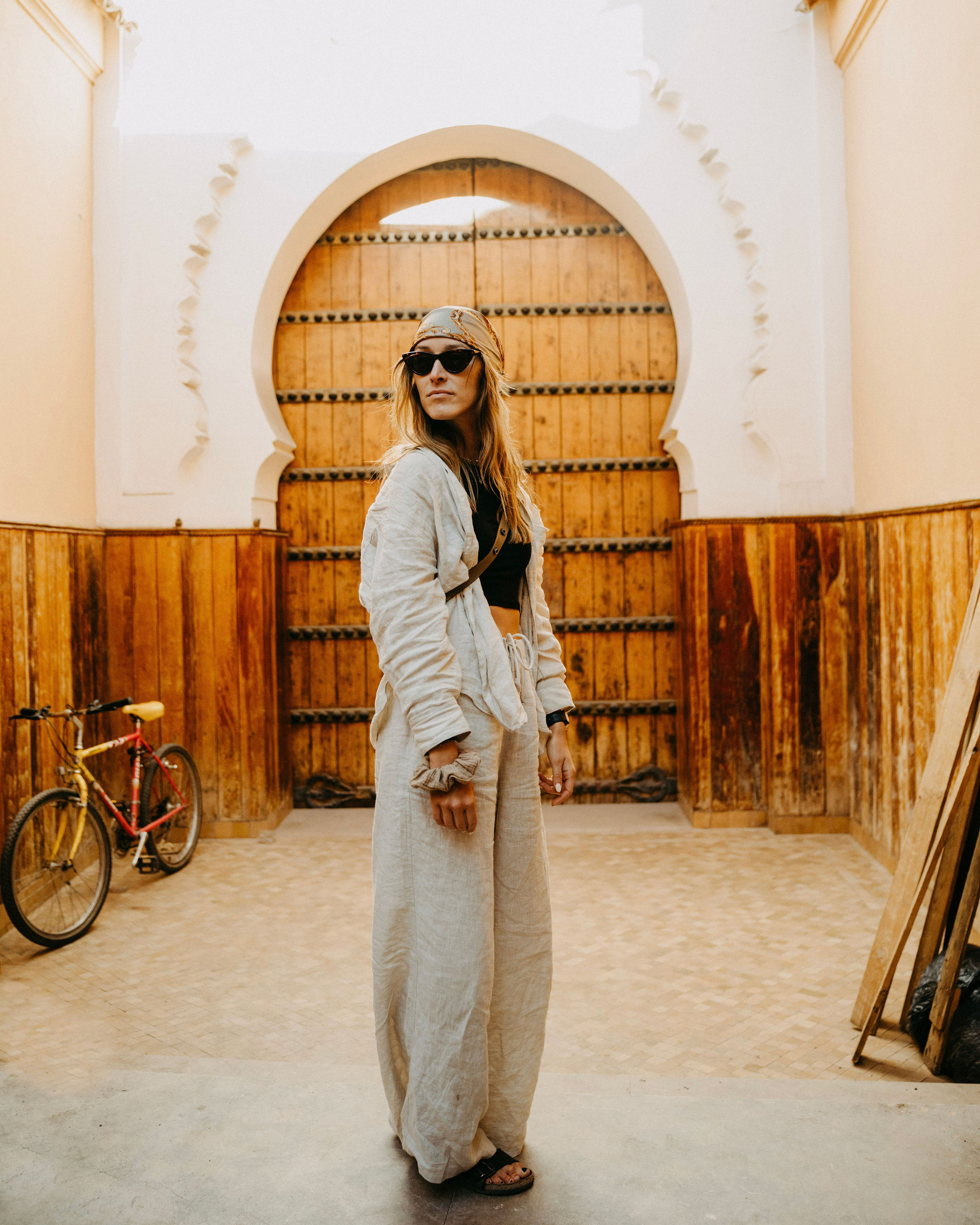 Walking through a narrow Moroccan souk alley