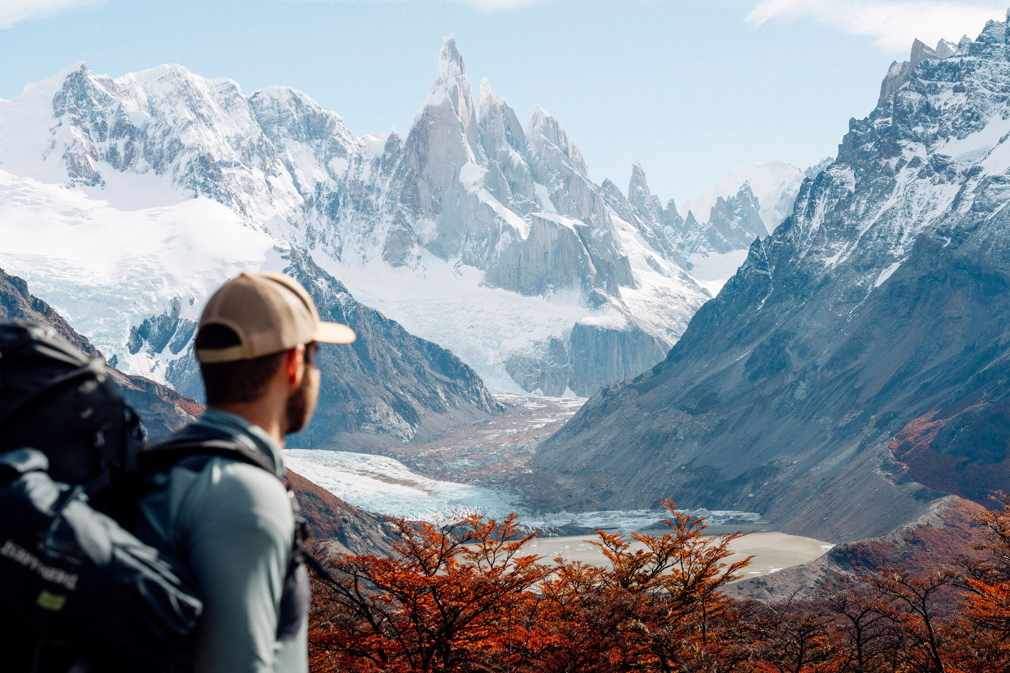Trekkers crossing a ridge in thick Patagonian fog